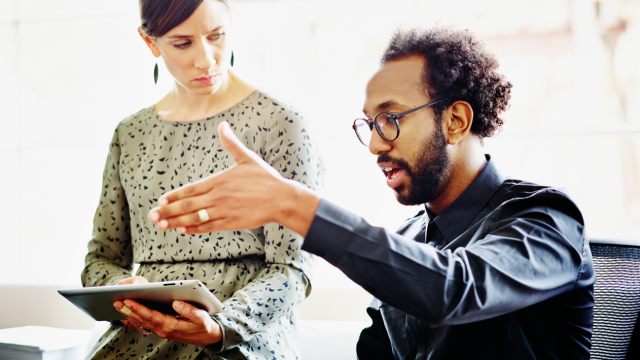 Two people collaborating 